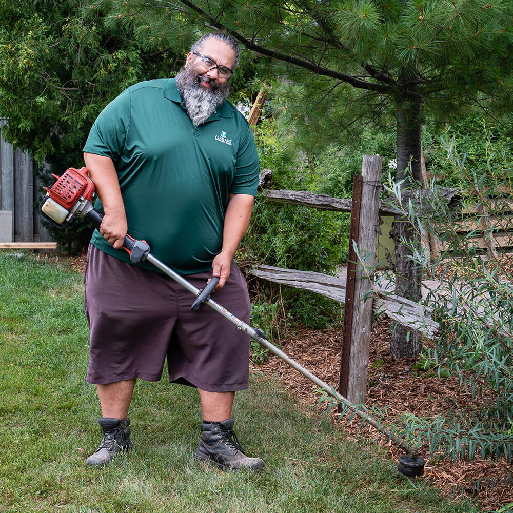 man using a line trimmer
